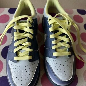 Nike Low-Top Sneakers in Pale Yellow & Slate Blue